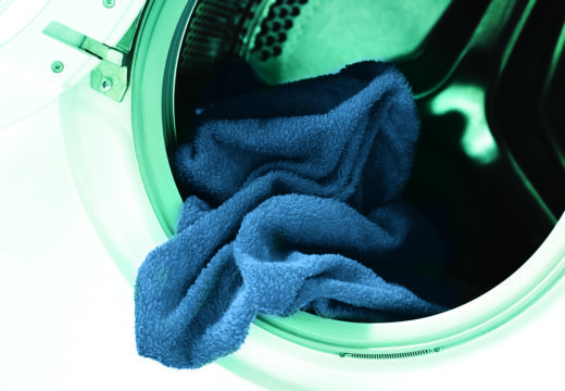 OPL vs. Outsourced Laundry: Which is Better for Your Business?