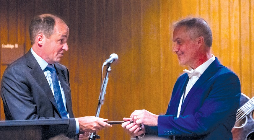 Former TCATA President Mack Magnus of M & B Hangers (L) who passed the gavel to Rusty Smith of Forenta. Smith begins his term as TCATA’s next president.